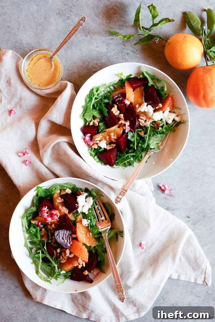 A serving of vibrant quick pickled beets arranged artfully on a plate, showcasing their inviting texture and rich color.