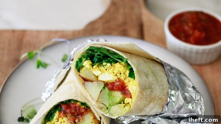Hearty vegan breakfast burritos filled with tofu scramble