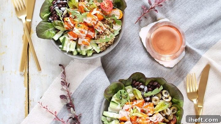 Colorful vegan fiesta buffalo tofu bowls with a creamy tahini lime crema