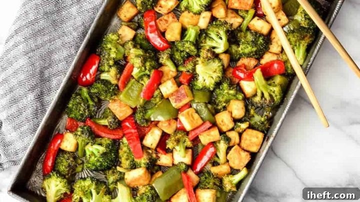Sheet pan baked crispy tofu and vegetables with peanut sauce