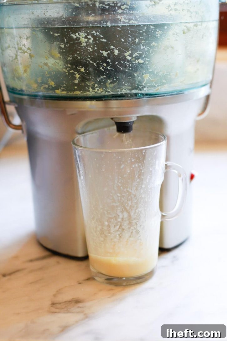 A juicer making ginger shots. 