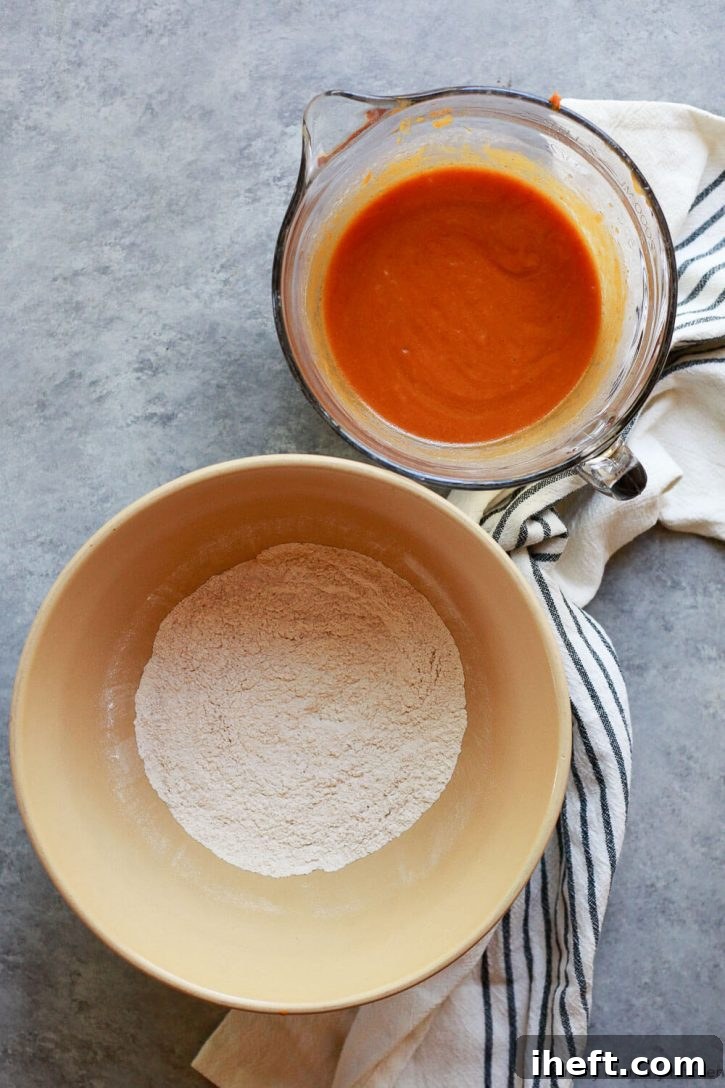 Bowls of wet and dry ingredients for making vegan pumpkin bread. 