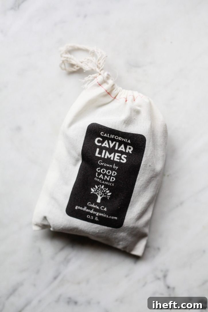 A canvas bag filled with caviar limes from Good Land Organics, sold by Fruit Stand. 