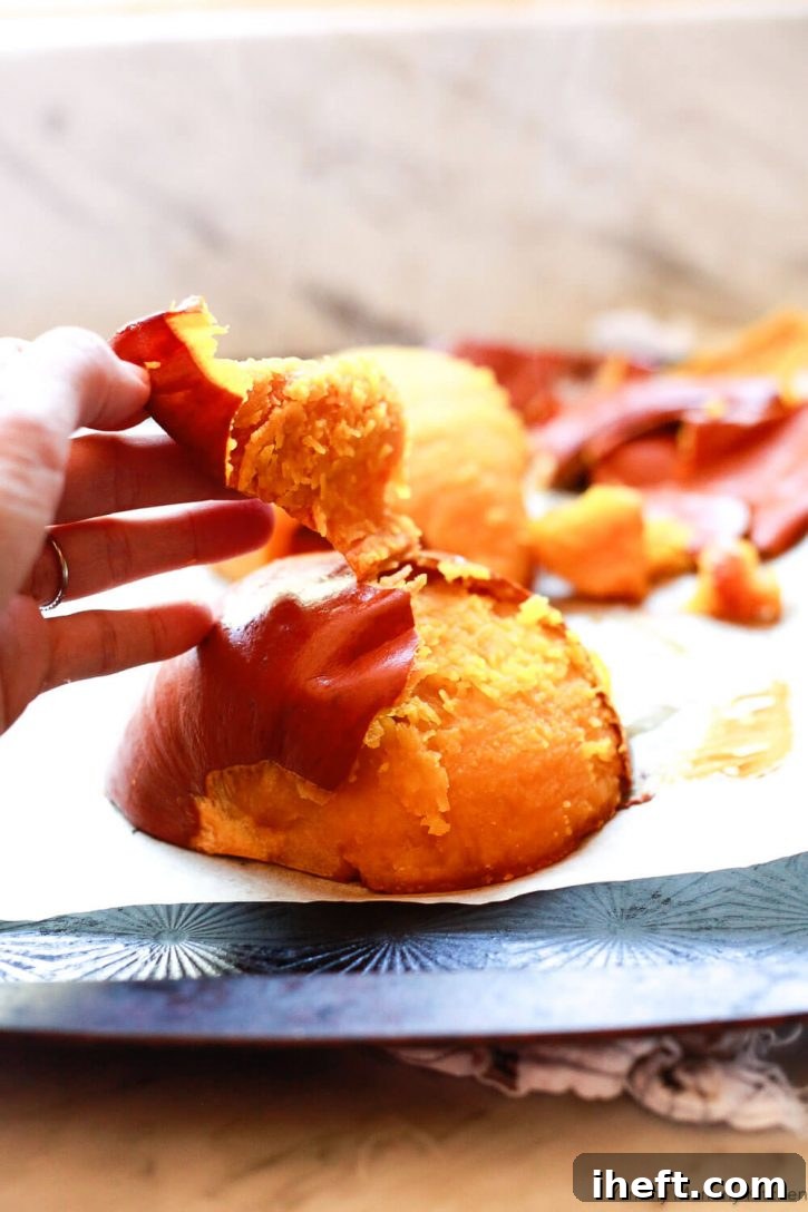 Skin is peeled off a roast pumpkin. Learn how to cook pumpkin. 