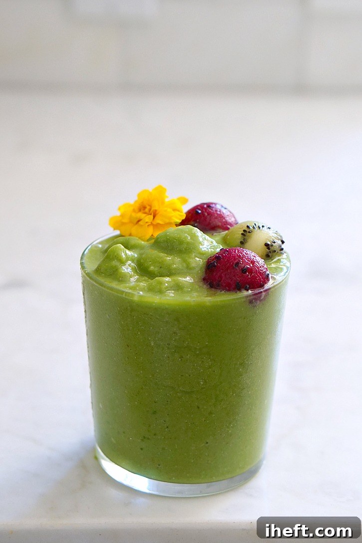 A vibrant and fresh green smoothie, representing a curated collection of the 20 absolute best green smoothie recipes designed for optimal health and comprehensive wellness.