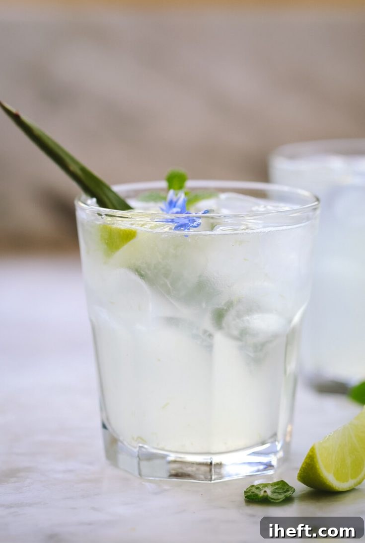 A vibrant glass of homemade aloe vera juice drink, showcasing its potential benefits for supporting liver detoxification, promoting clear, radiant skin, and providing deep, internal hydration.