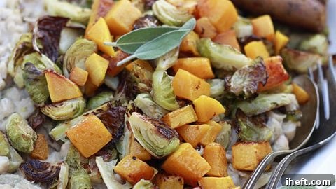 White bean mash with roasted butternut squash and Brussels sprouts is a healthy, hearty vegetarian side or main dish.