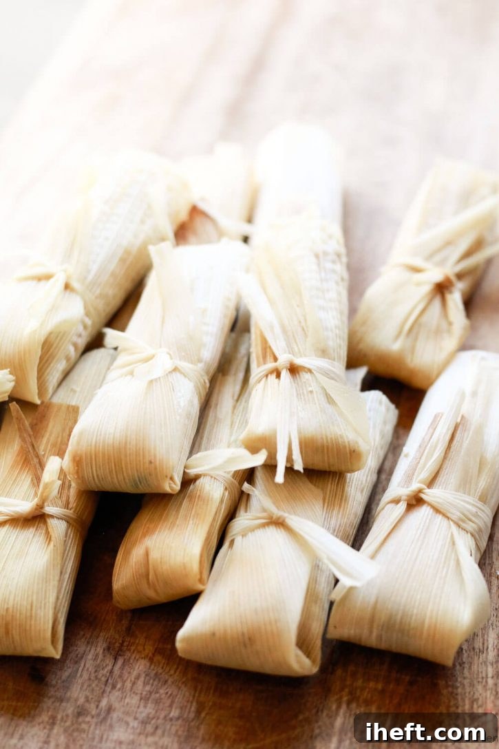 Beautiful vegetarian and vegan tamales are wrapped, tied, and ready to be steamed. 