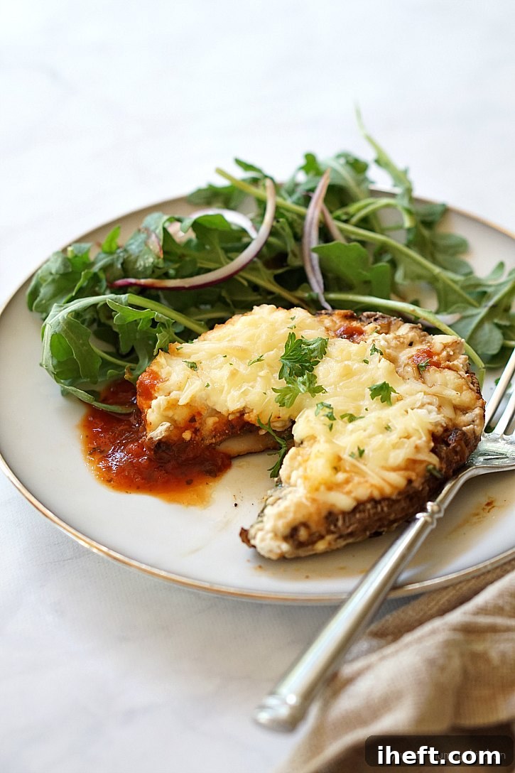 Vegan lasagna stuffed portobello mushroom made with almond ricotta.