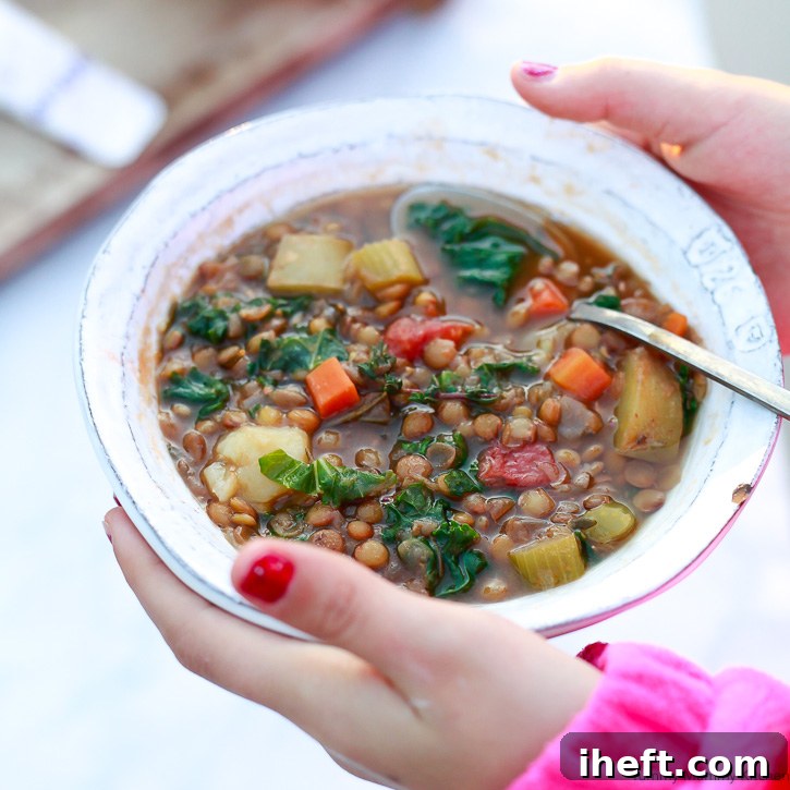 A hearty bowl of Instant Pot lentil soup, rich with vegetables and lentils.
