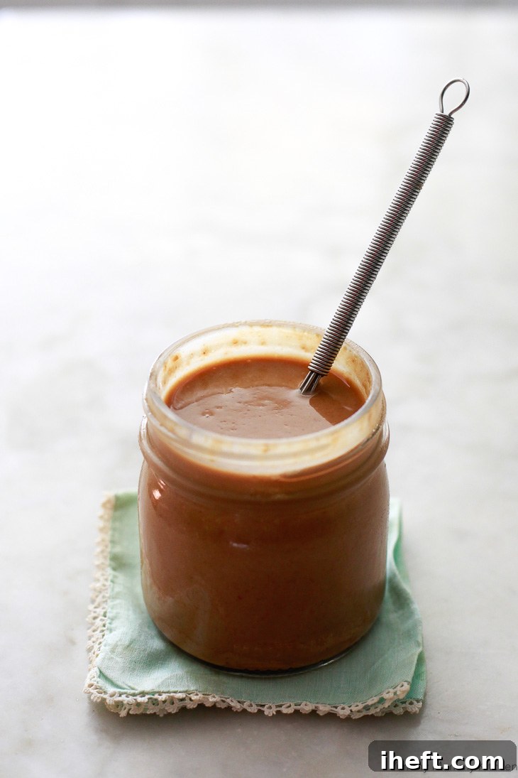 The best simple and easy Thai peanut sauce recipe! This peanut sauce comes together in one bowl in five minutes and is delicious with spring rolls, satay, or noodles. 