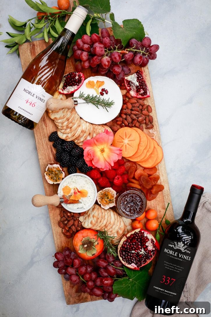 An exquisite charcuterie board brimming with a vibrant assortment of fresh fruits, gourmet nuts, various cheeses, and delectable spreads, beautifully presented for a wine tasting.