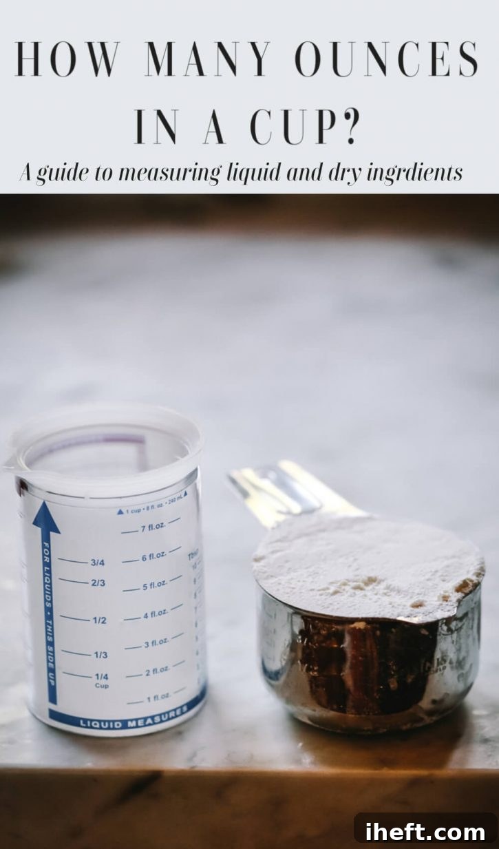 A liquid measuring cup filled with water sits beside a dry measuring cup filled with flour, illustrating the difference and proper technique for measuring liquid and dry ingredients accurately.