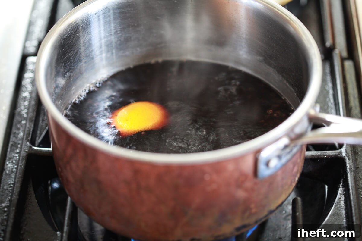 Elderberry tea simmers on the stove.