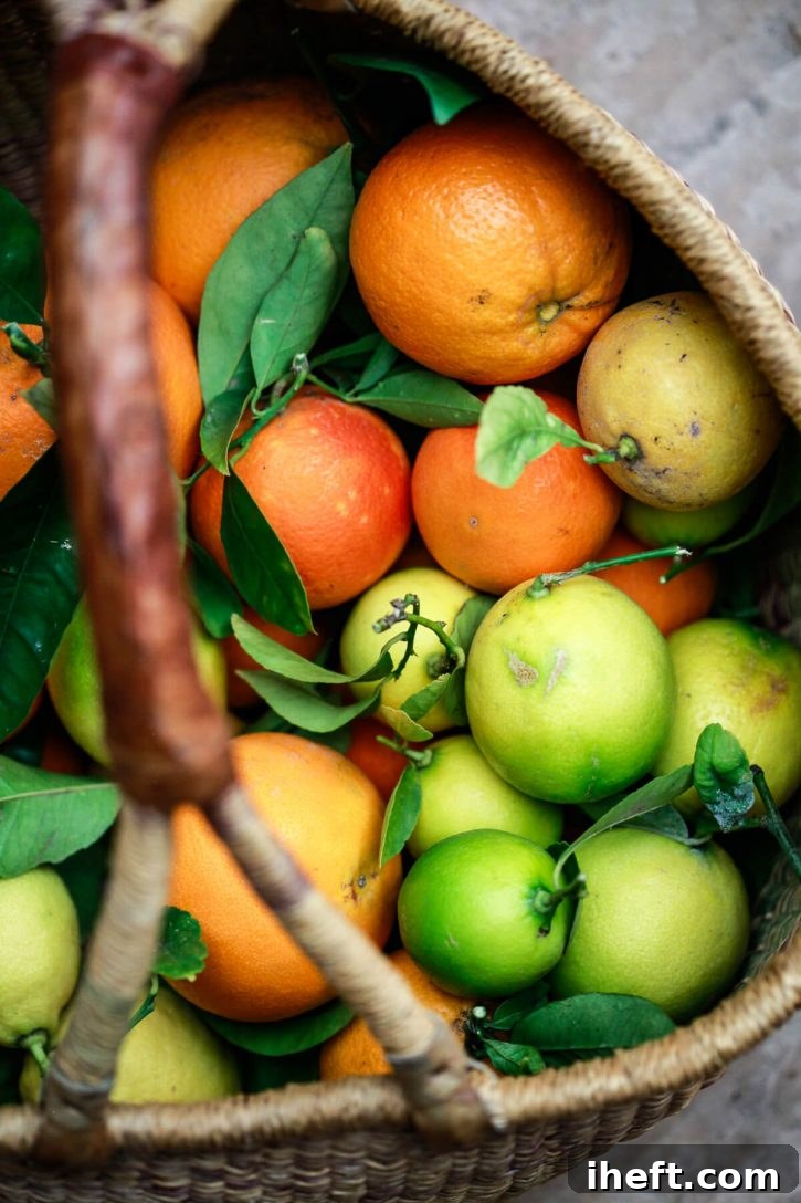 A rustic basket overflows with an abundant harvest of freshly picked limes, oranges, and lemons, showcasing the vibrant colors and natural beauty of backyard citrus. 
