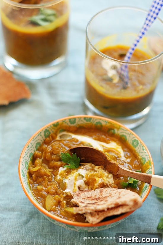 Inviting bowls of flavorful pumpkin lentil soup, showcasing its warm color and hearty texture.