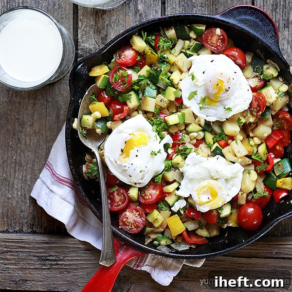 Veggie hash in a red le Creuset cast iron skillet.