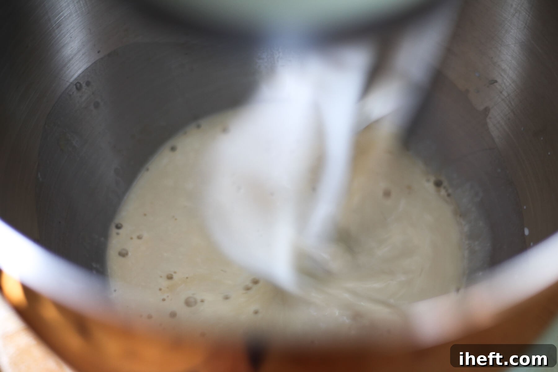 The wet ingredients for vegan cupcakes are mixed together.