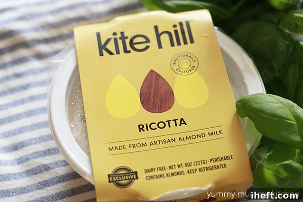 A package of almond based Kite Hill ricotta cheese. A healthy vegan plant based diary alternative. 