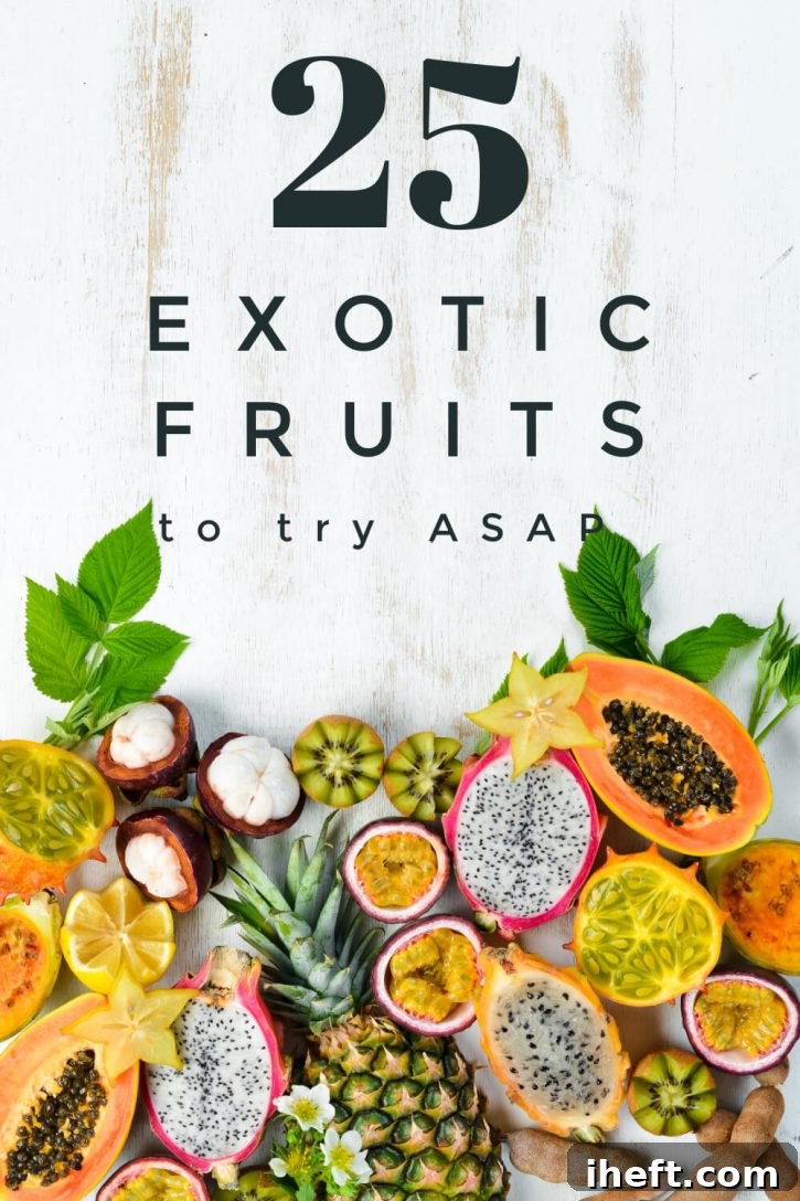 Beautiful exotic fruits arranged on a white surface with text overlay that reads "25 exotic fruits to try ASAP"