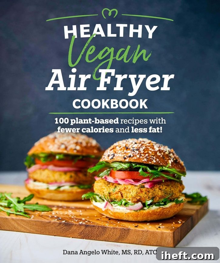 The cover of Healthy Vegan Air Fryer Cookbook which shows two veggie burgers on the front. 