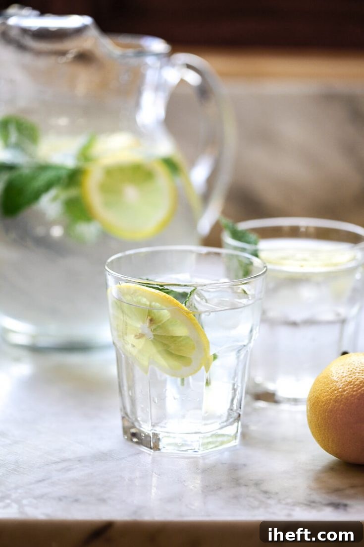 Lemon water on a white kitchen counter.