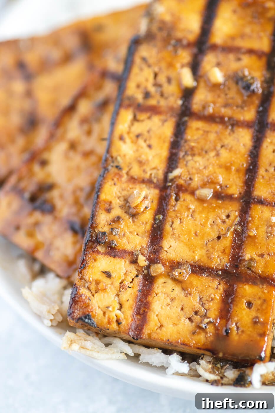 A close-up of grilled tofu steaks. 