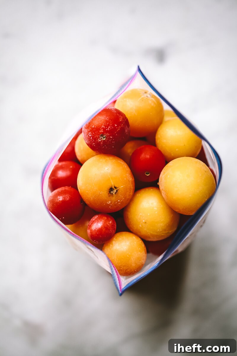 A photo of a bag of frozen tomatoes. 