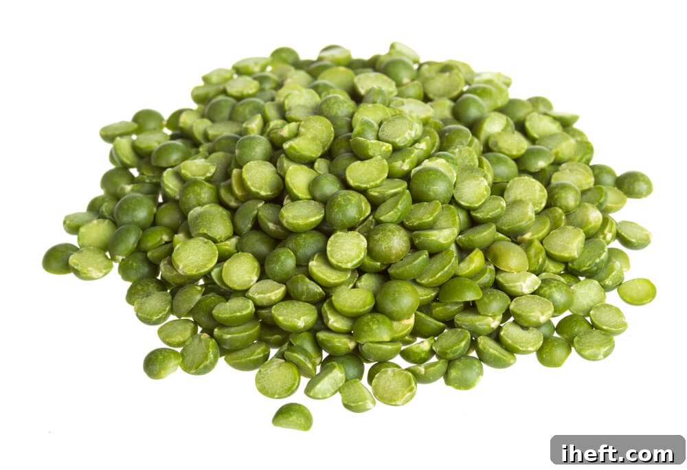 A close up photo of dried split peas, showing their distinctive split form.