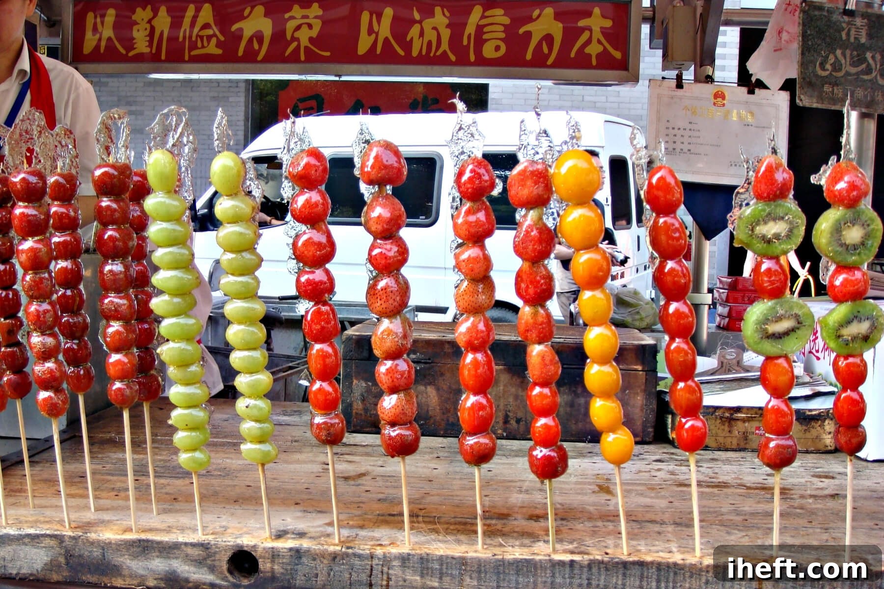 Fruit Tanghulu being sold on the street in Beijing, China.