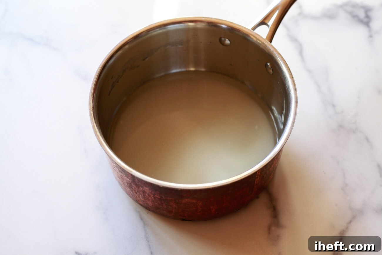 Water and sugar in a small saucepan.