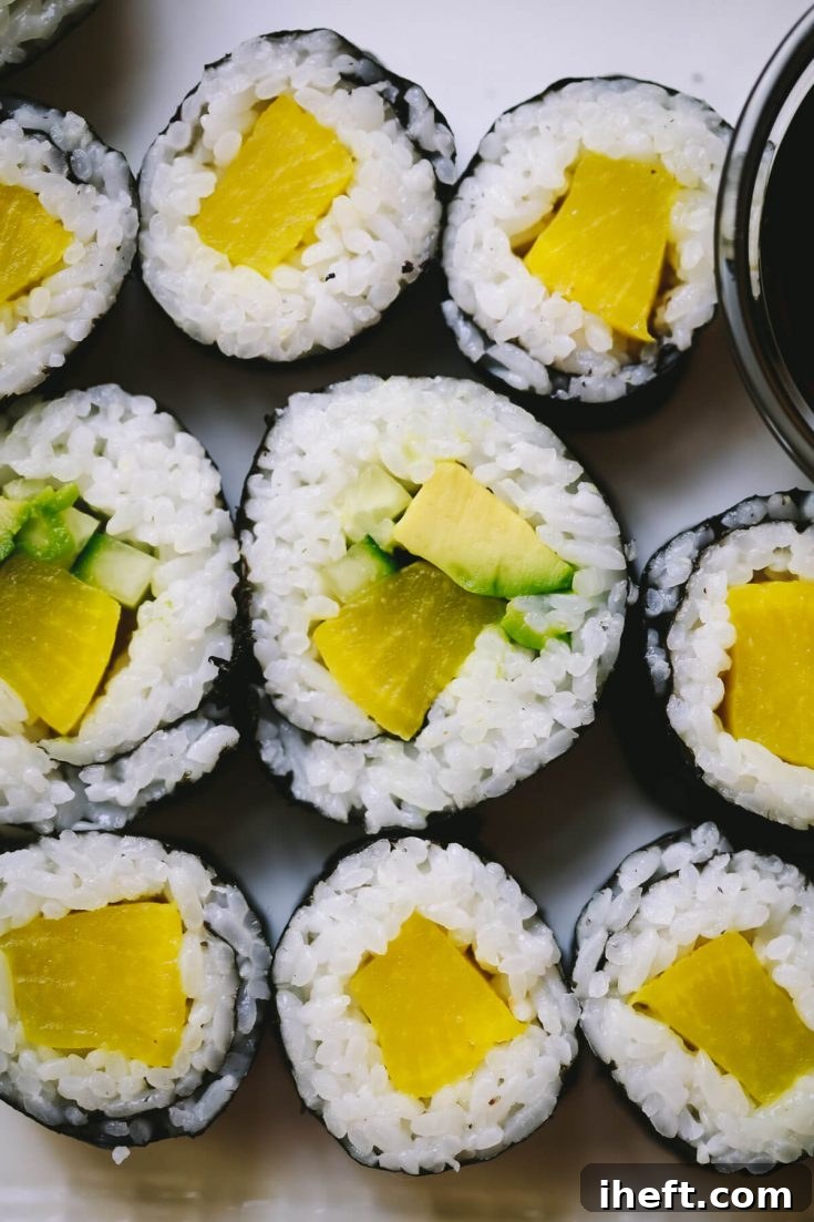 A visual representation of an oshinko roll sushi on a white plate, perfect for pinning to Pinterest.