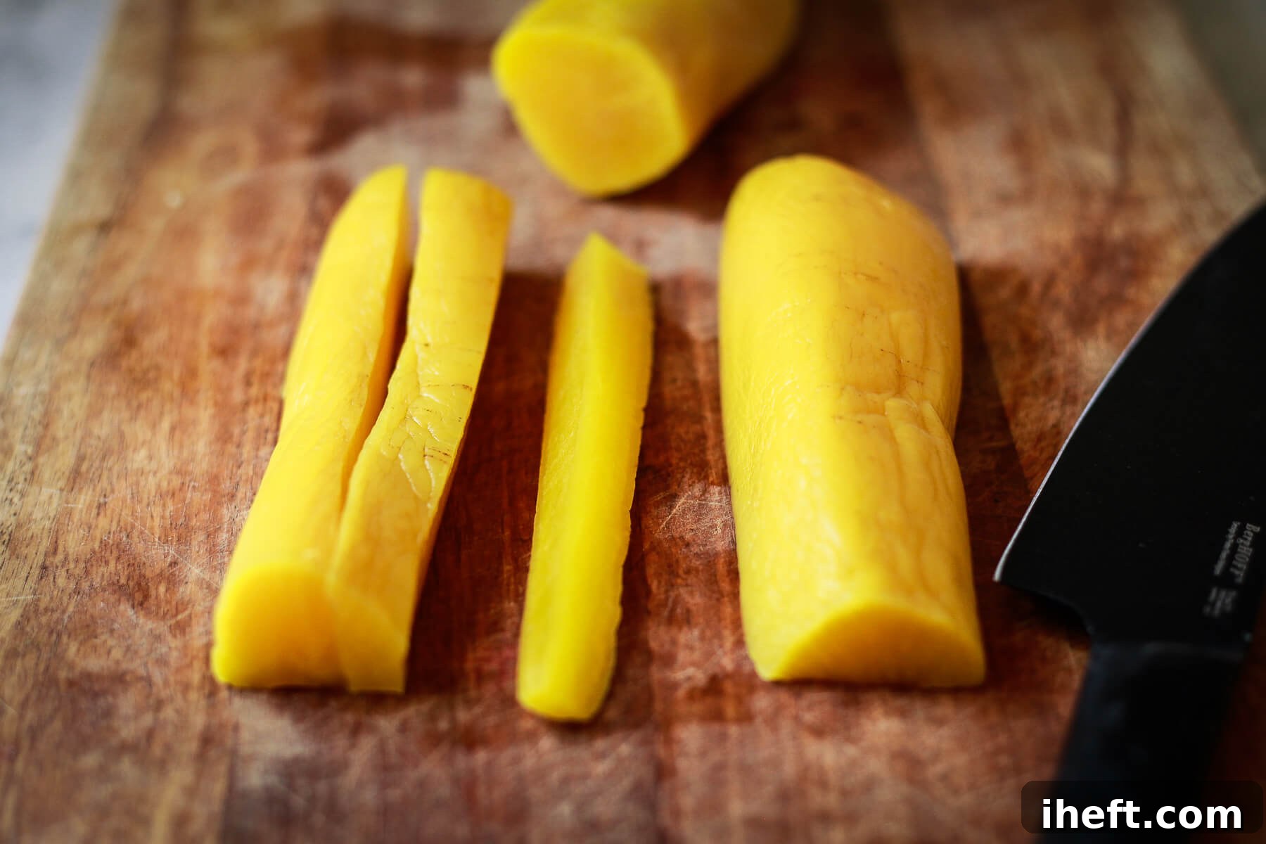 Yellow oshinko expertly cut into slender lengthwise strips, perfectly sized for sushi filling.