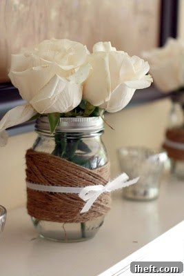 Close-up of twine-wrapped Mason jars