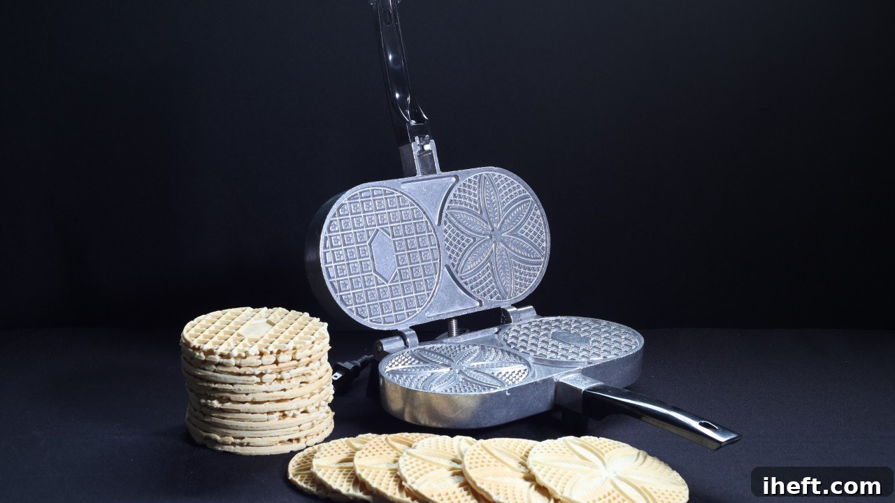 A close-up shot of the sturdy plates of a Palmer Pizzelle Maker, highlighting its durable construction.