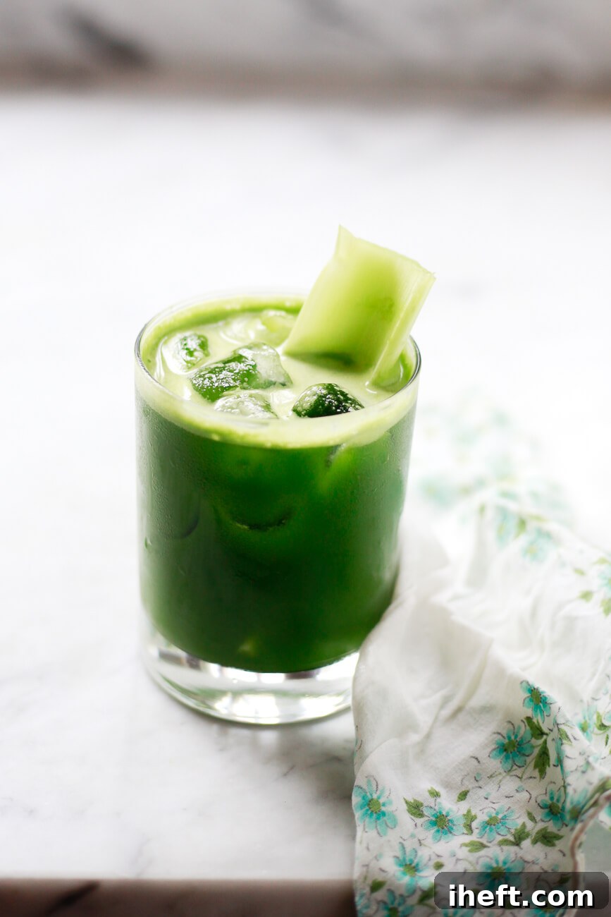A glass of Detox Green Juice, ready to be shared on Pinterest.