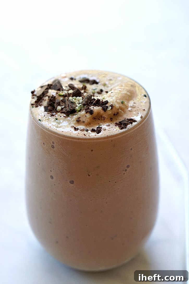 Rich chocolate banana smoothie featuring maca powder for energy and hormone balance.