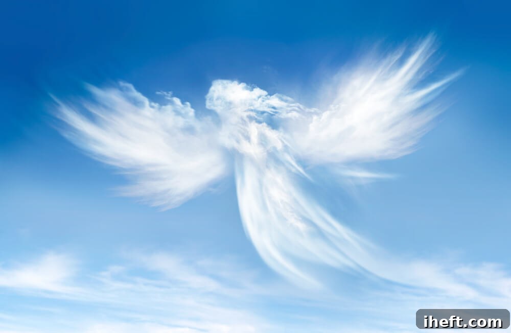 A blue sky with clouds that look like an angel.