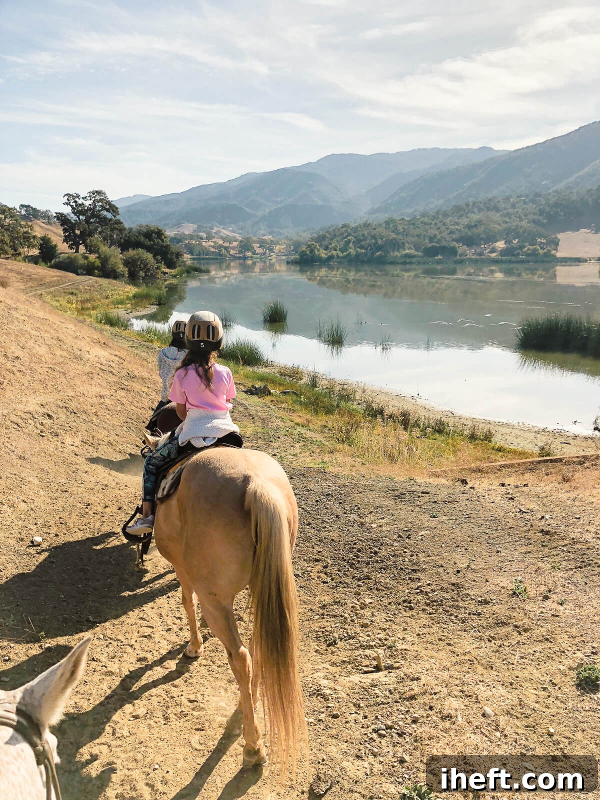 A young girl rides a palomino pony at the Alisal Ranch. 