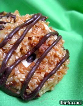 Close-up of a perfectly cut homemade Samoa bar, showcasing its distinct layers.