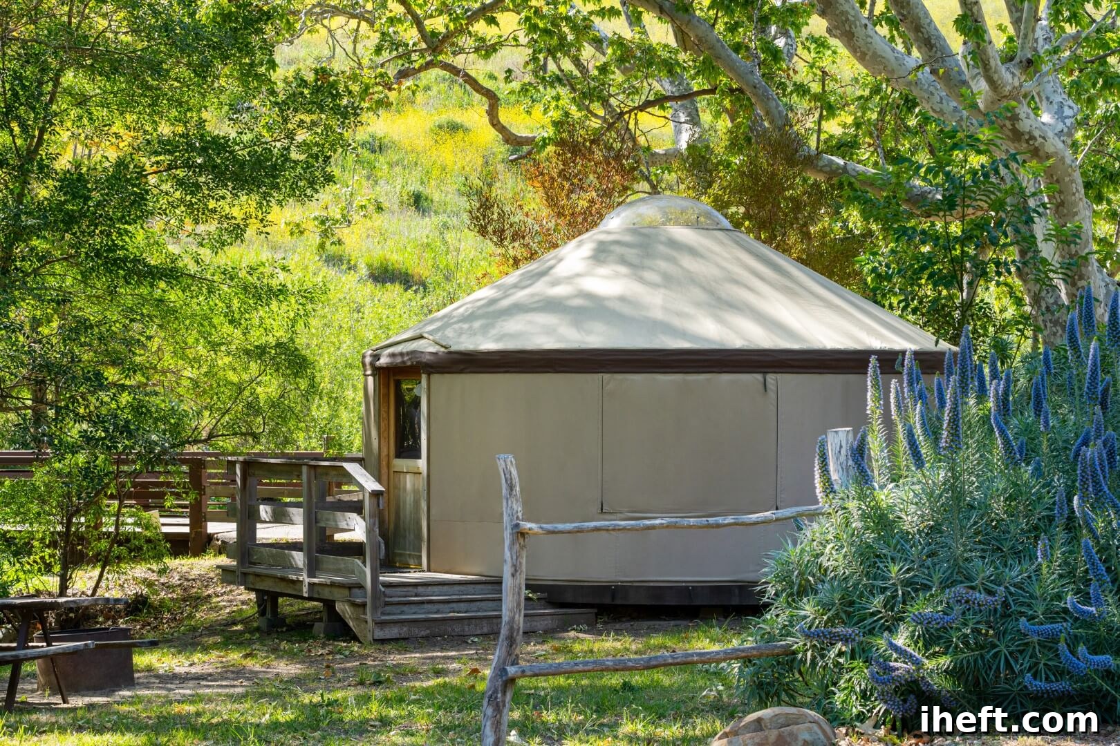 A cozy and well-appointed yurt, ready for a luxurious glamping stay at El Capitan Canyon in Santa Barbara. The interior reveals comfortable furnishings and a welcoming atmosphere.