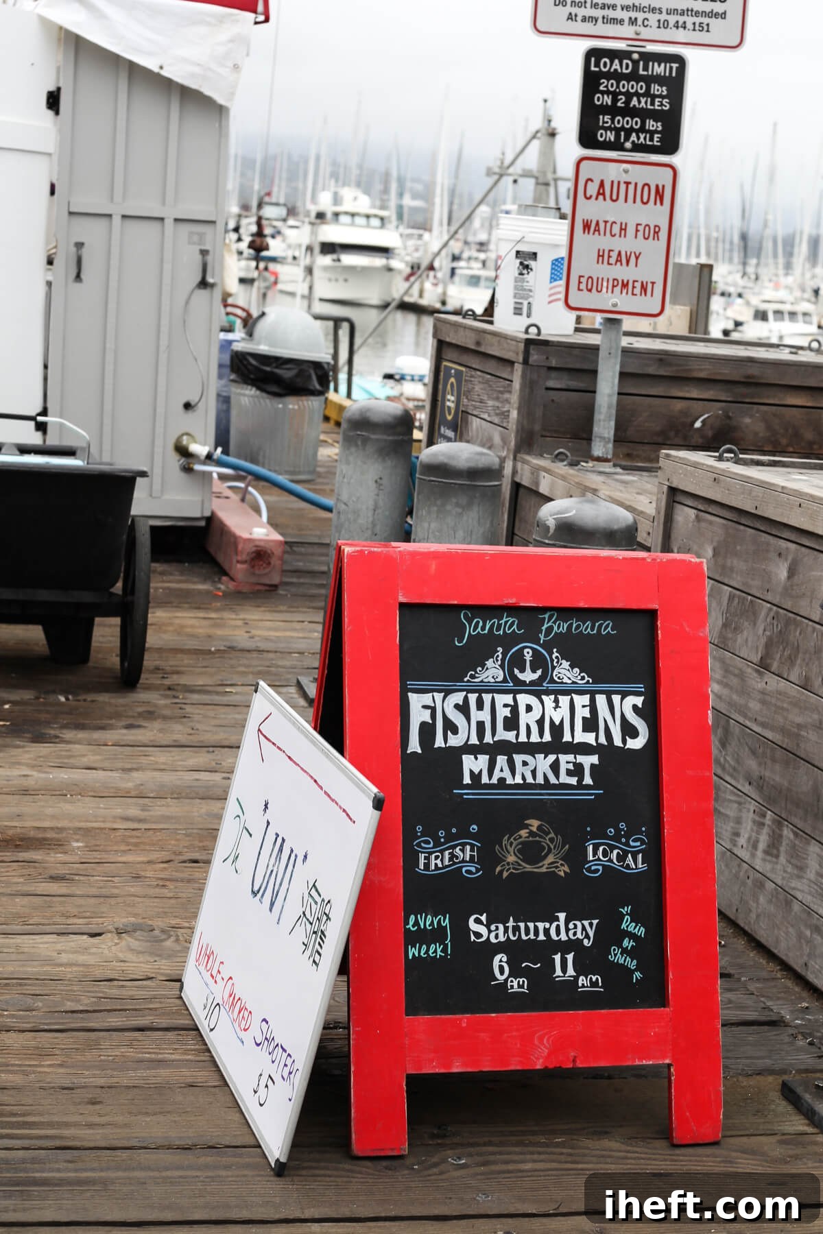 A red-framed chalkboard sign reading 