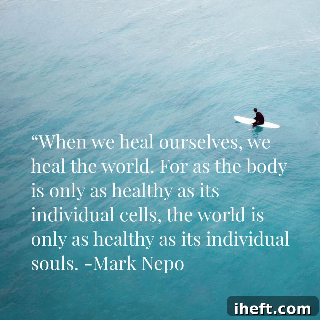 A peaceful photograph of a surfer sitting in calm blue water with a quote that reads: “When we heal ourselves, we heal the world. For as the body is only as healthy as its individual cells, the world is only as healthy as its individual souls.” -Mark Nepo