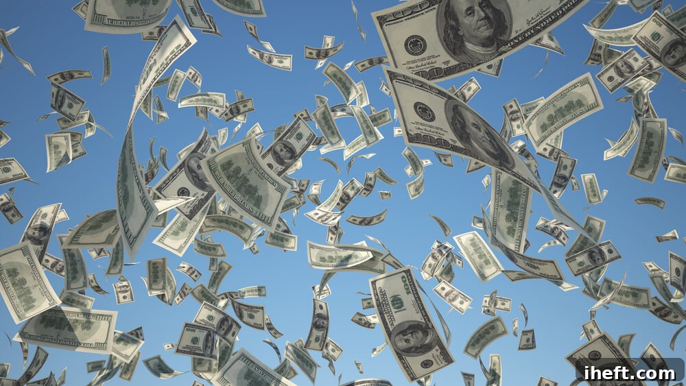 Hundred dollar bills floating down from the sky. 