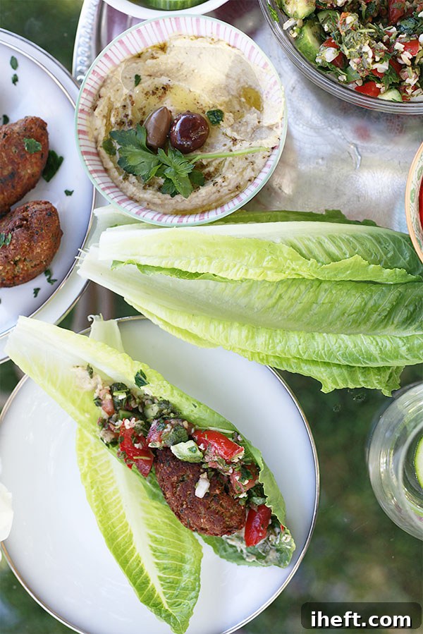 Vegan lettuce wraps with falafel, hummus, and tabbouleh