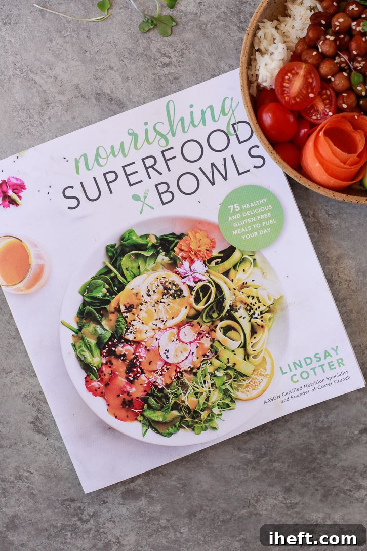The cover of 'Nourishing Superfood Bowls' cookbook by Lindsay Cotter of Cotter Crunch, featuring an enticing recipe image.