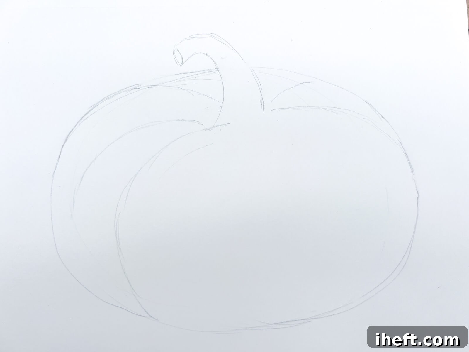 A light pencil on white paper sketch of how to draw a pumpkin.