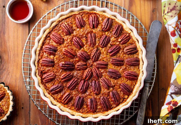 Decorative image for Pinterest sharing, showing a pecan pie with text overlays for storage tips.