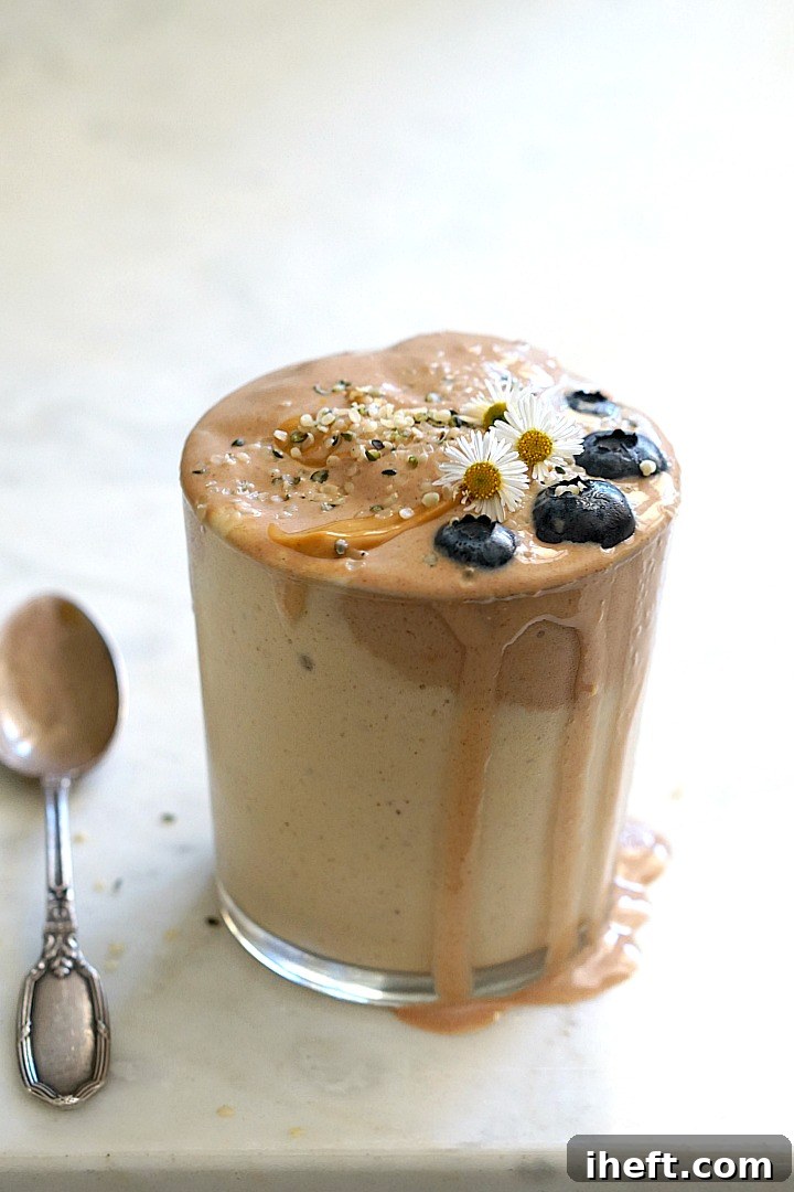 A decadent and healthy peanut butter, chocolate, and banana hemp smoothie recipe, perfect for a treat or post-workout.