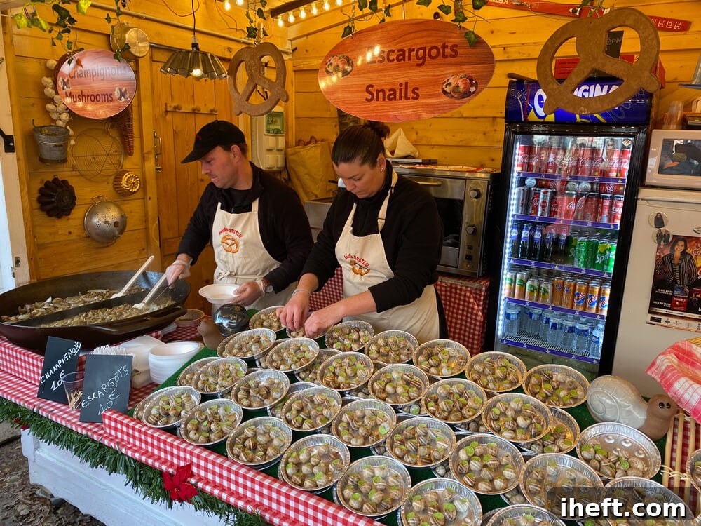 Escargot snails, likely Helix Pomatia or Helix Aspersa, are carefully displayed for sale at a bustling market stall in Paris, showcasing their shells and fresh appearance.